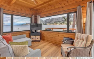 Olive Cabin Living area with exterior view of lake - Okanagan Resort rental accommodations on Skaha Lake - Ponderosa Point